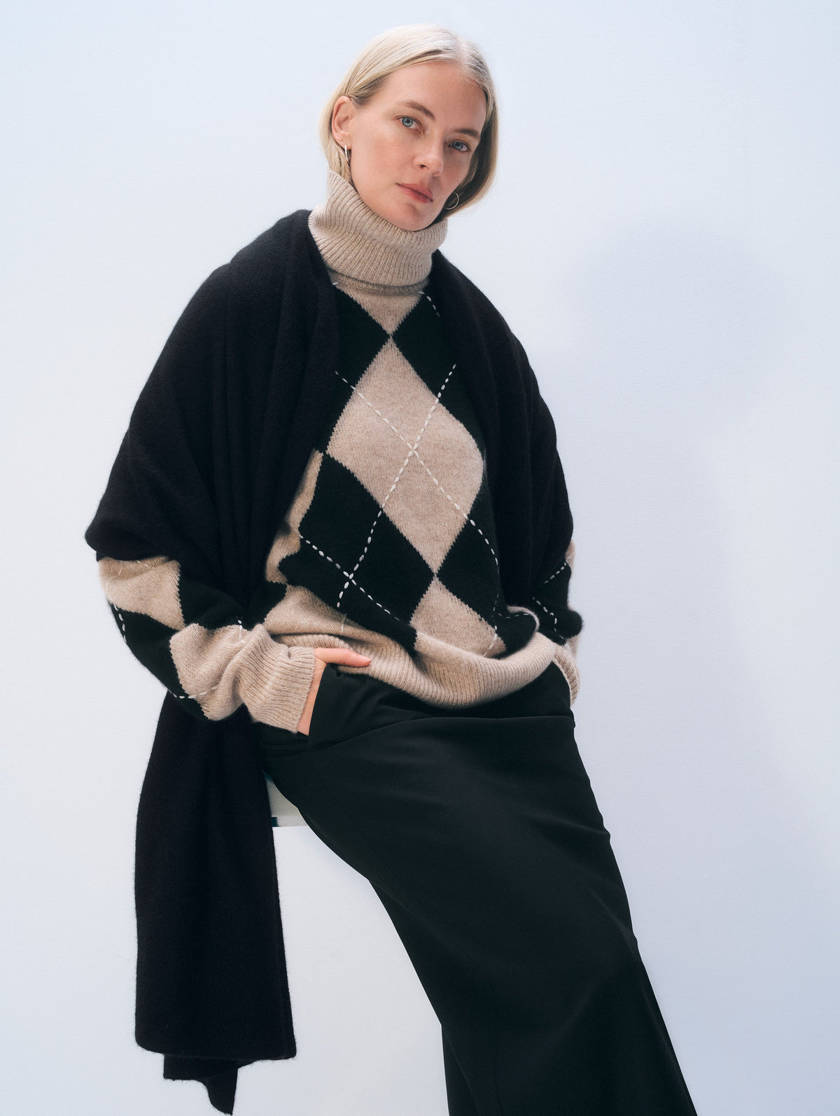White + Warren Travel Wrap in Black, draped on model