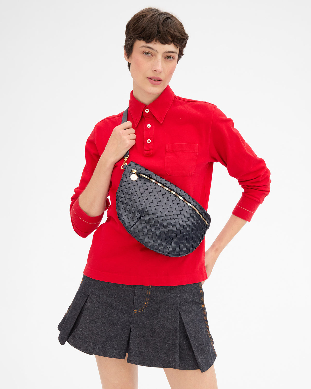 Clare V Grande Fanny in Twilight Navy Diagonal Woven worn crossbody by a model
