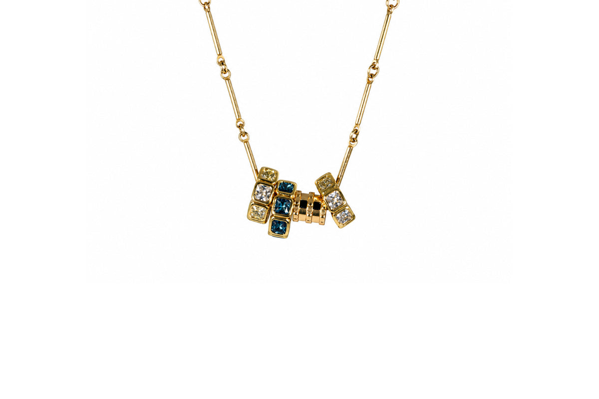 Rachel Nathan Crystal Rondelles on Bar Chain necklace, full front view of the gold-filled rondelle centerpiece with clear and blue bezel crystals