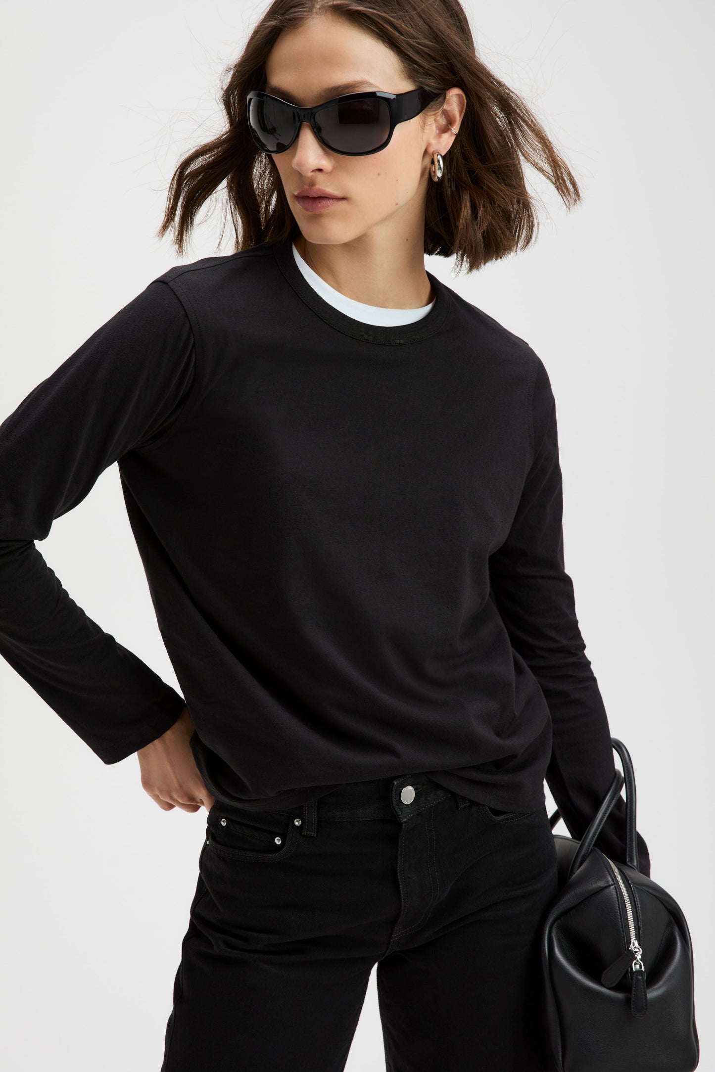 Sold Out NYC The Long Sleeve Perfect Tee in Black, shown on model