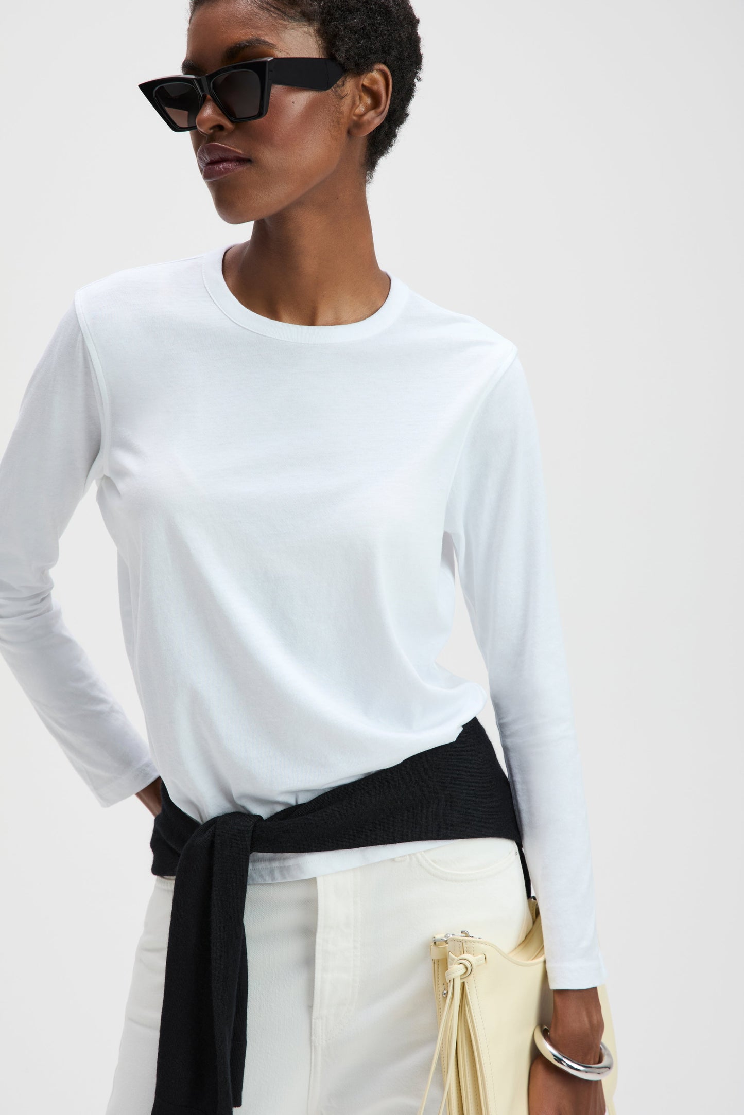 Sold Out NYC The Long Sleeve Perfect Tee in White, shown on model