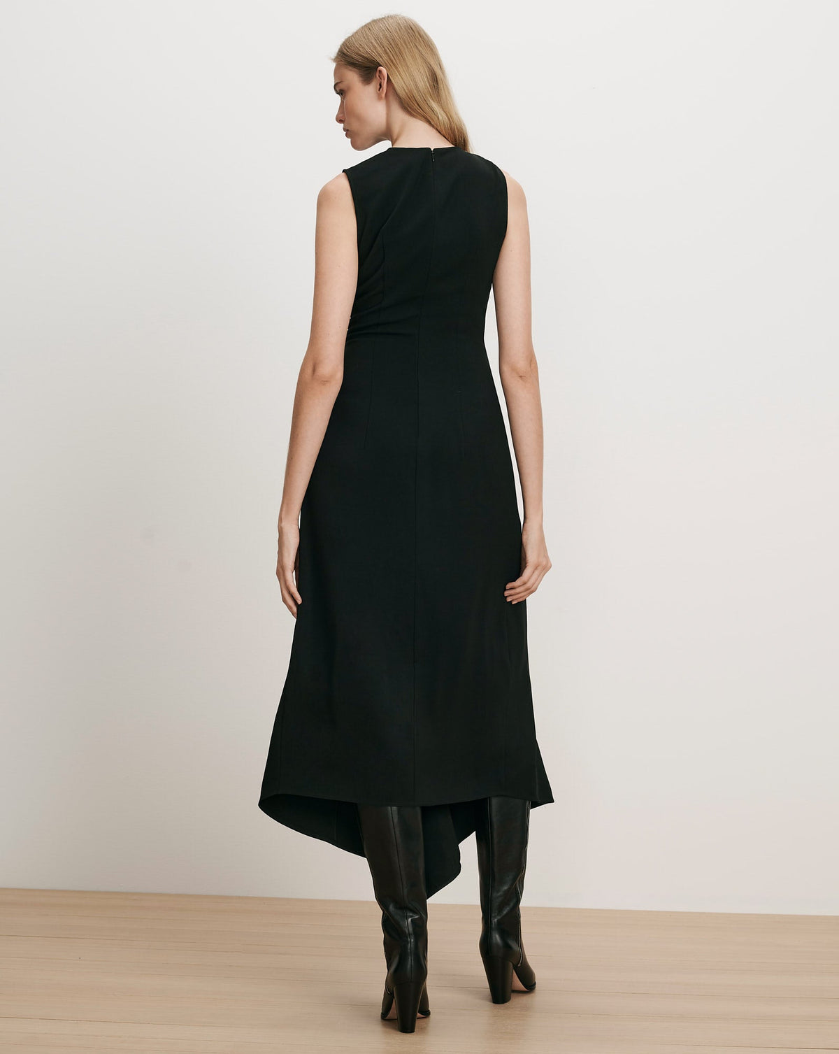 Veronica Beard Freja Dress in Black, alternate view on model showing the asymmetric hem