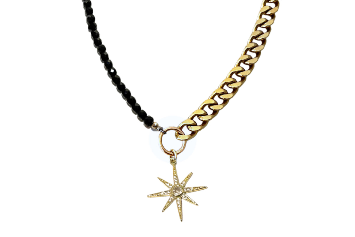 Rachel Nathan Spinel & Spur necklace, full front view of faceted spinel cubes with gold-filled pave spur pendant on brass curb chain