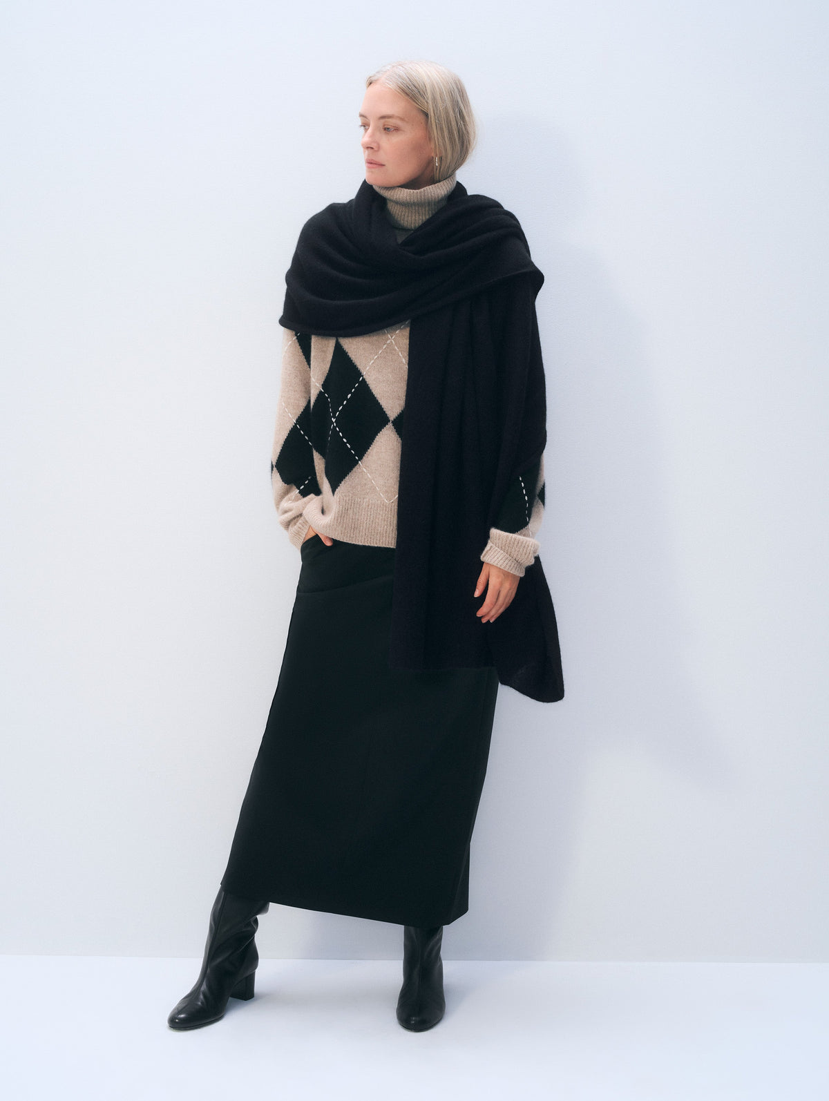 White + Warren Travel Wrap in Black, shown on model, full length