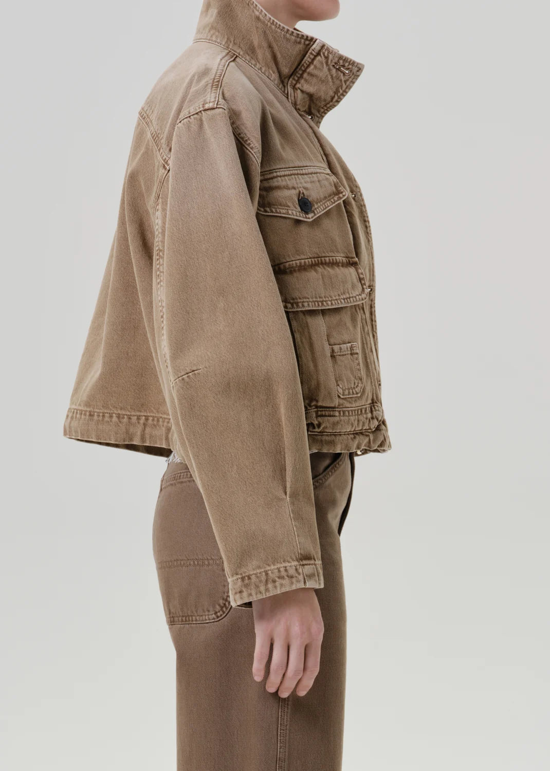 Citizens of Humanity Funnel Collar Barn Jacket in Tan, side view showing funnel collar and flap pockets