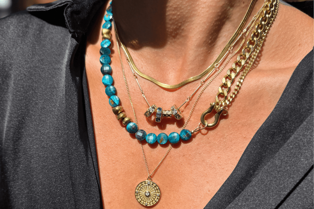 Rachel Nathan Crystal Rondelles on Bar Chain necklace shown on model, layered with other Rachel Nathan styles