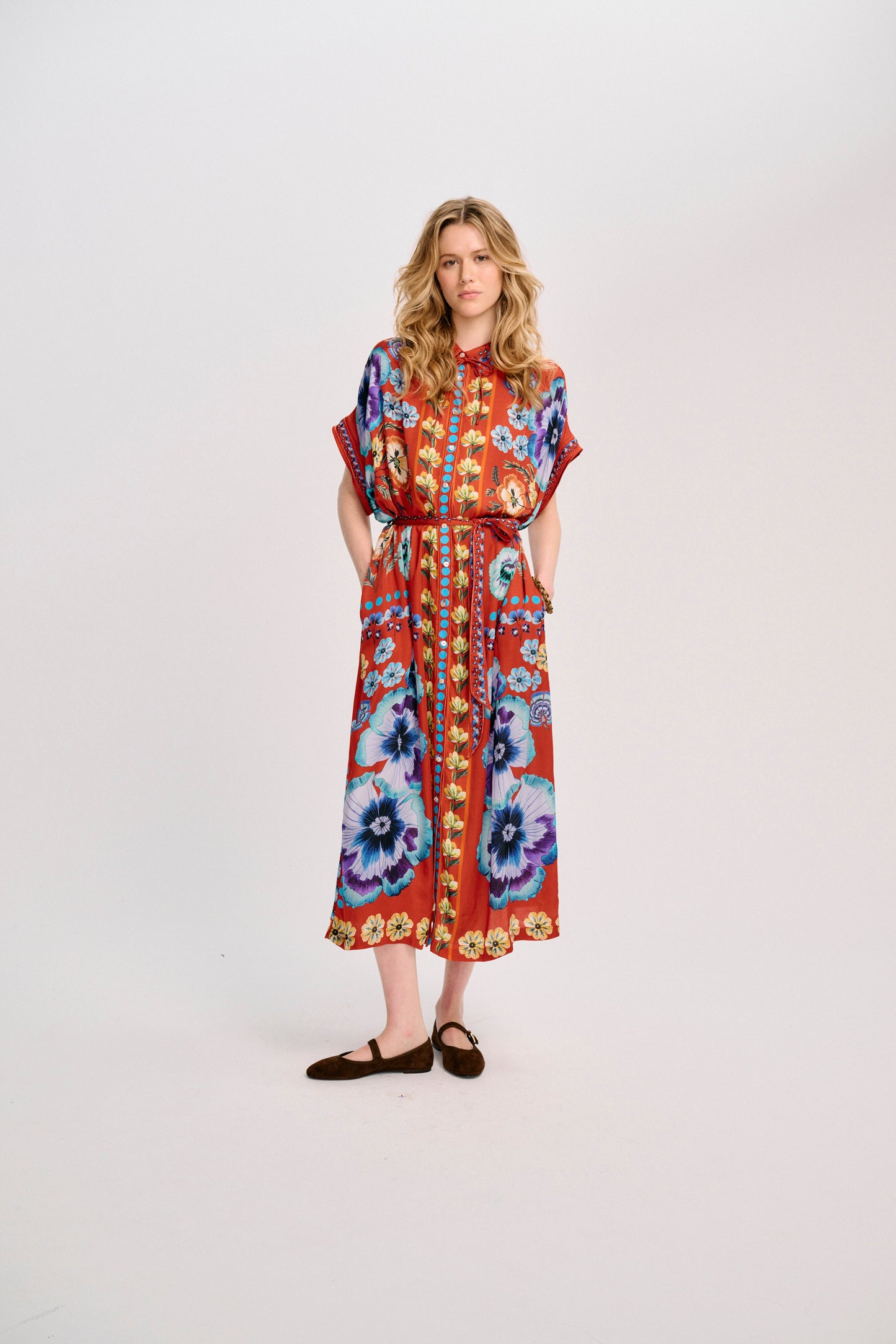 Carolina K Valerie Kaftan in Antique Floral Burnt Orange, worn with the self-tie belt