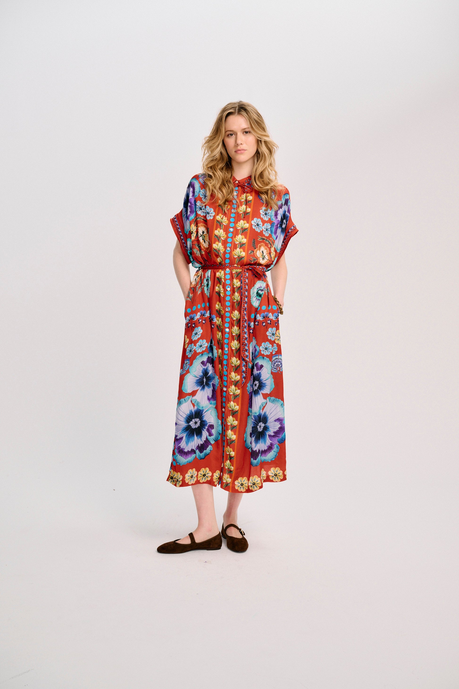Carolina K Valerie Kaftan in Antique Floral Burnt Orange, worn with the self-tie belt