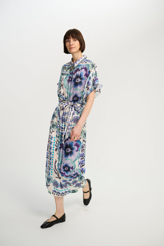 Carolina K Lynn Kaftan in Antique Floral Blue, worn with the self-tie belt