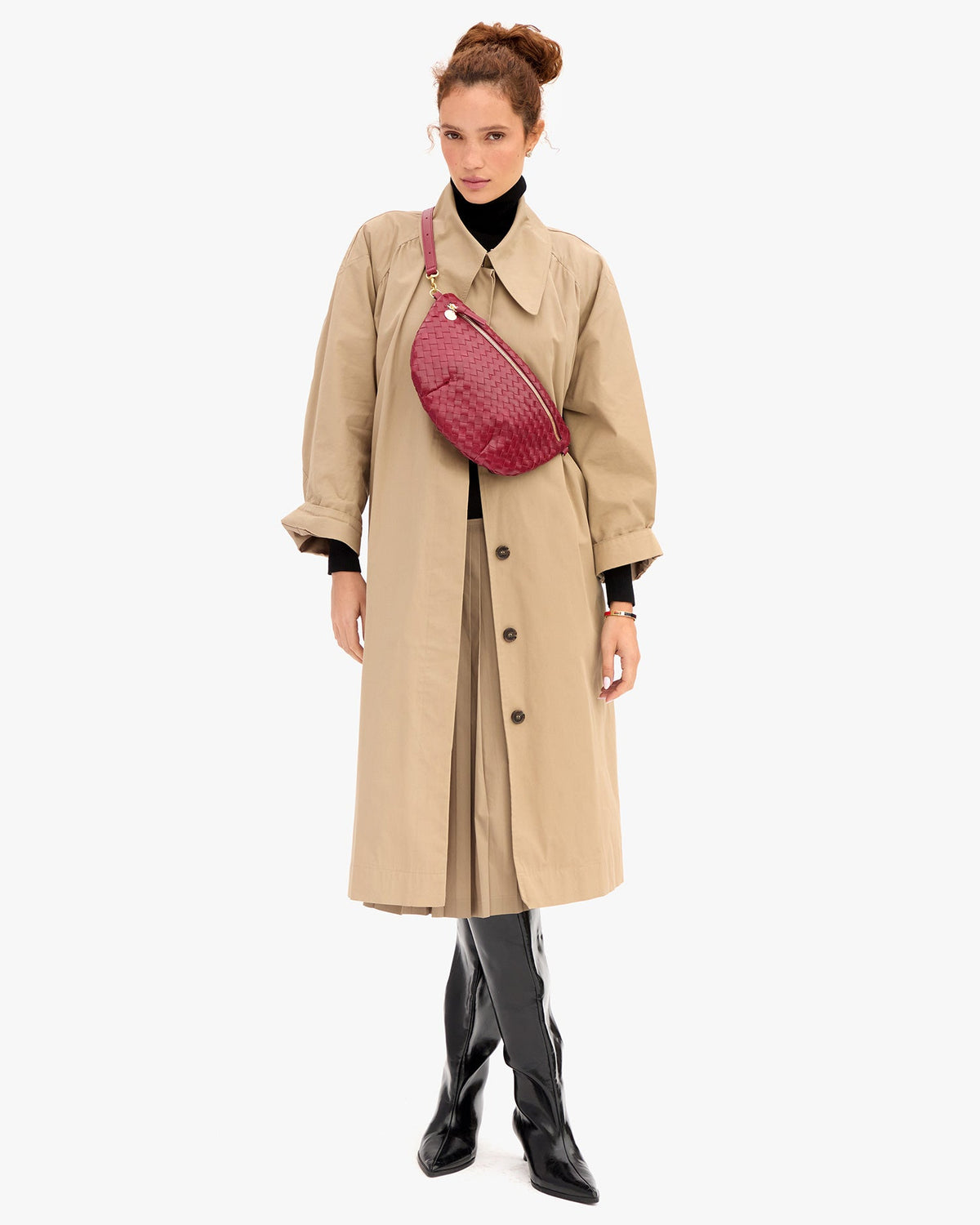 Clare V Grande Fanny in Garnet Diagonal Woven, shown on model as a crossbody