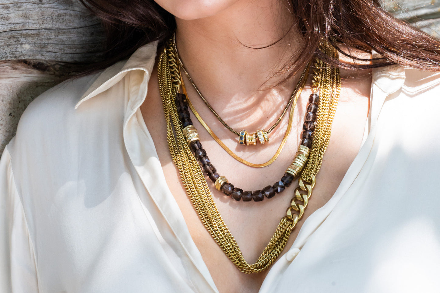 Rachel Nathan Ice Obsidian & Brass Heishi necklace shown on model