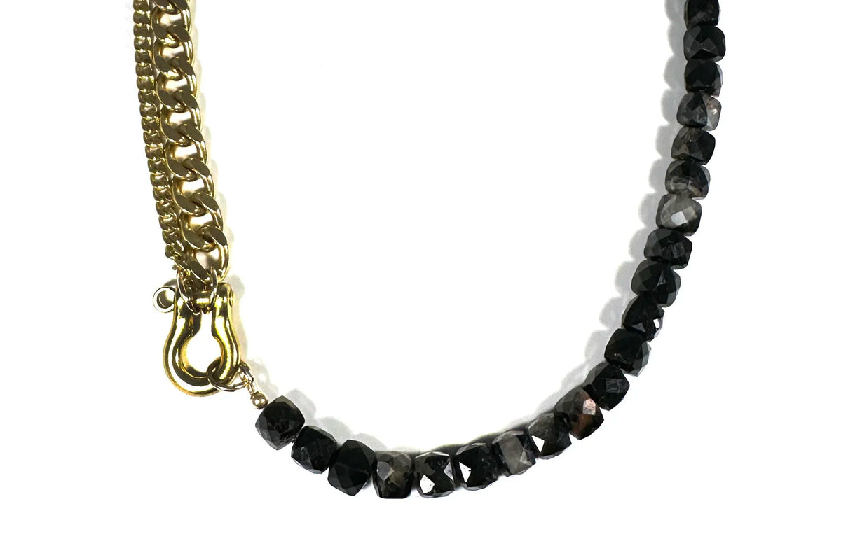 Rachel Nathan Shackle Duo: Black Tourmaline Cubes necklace, full front view of faceted black tourmaline cubes with brass shackle clasp