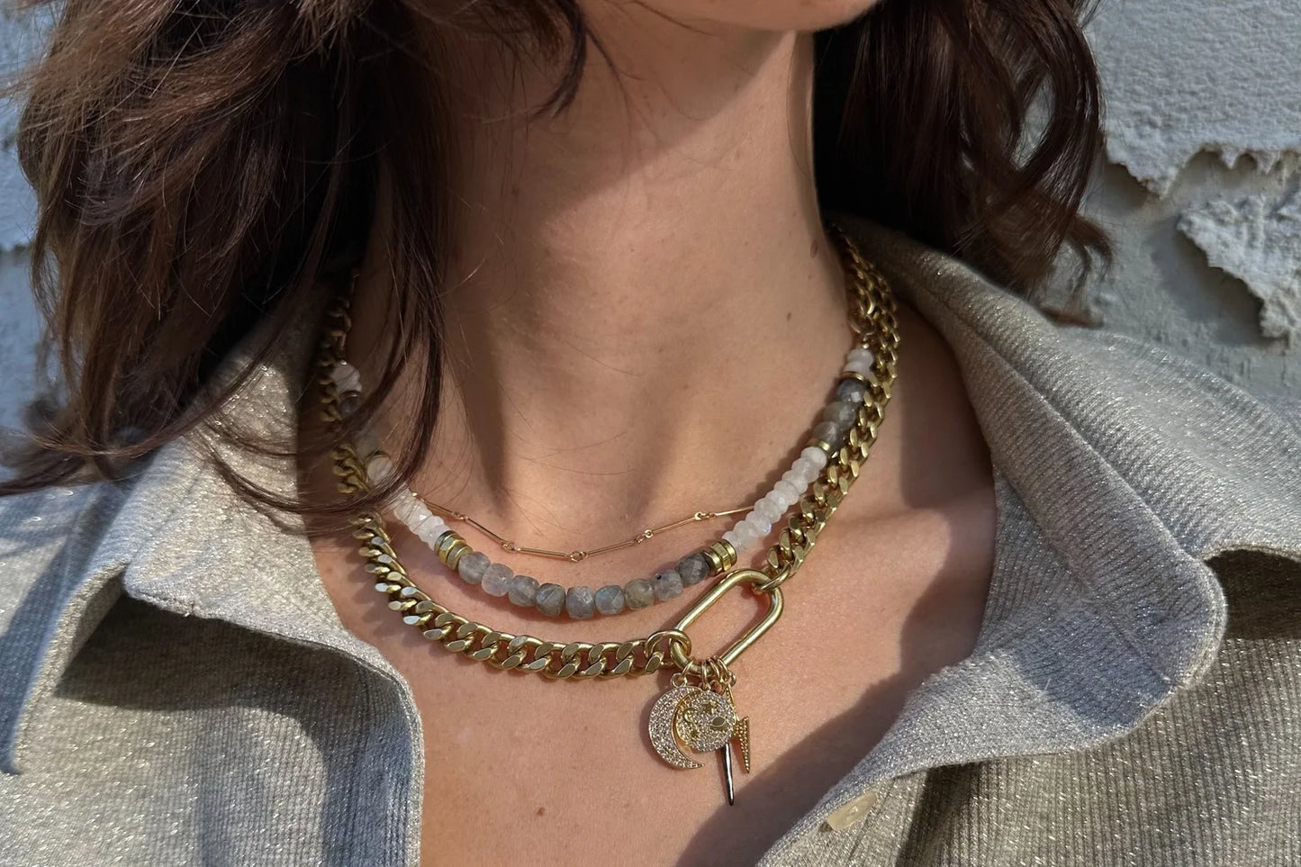 Rachel Nathan Race Track & Celestial Charms necklace shown on model