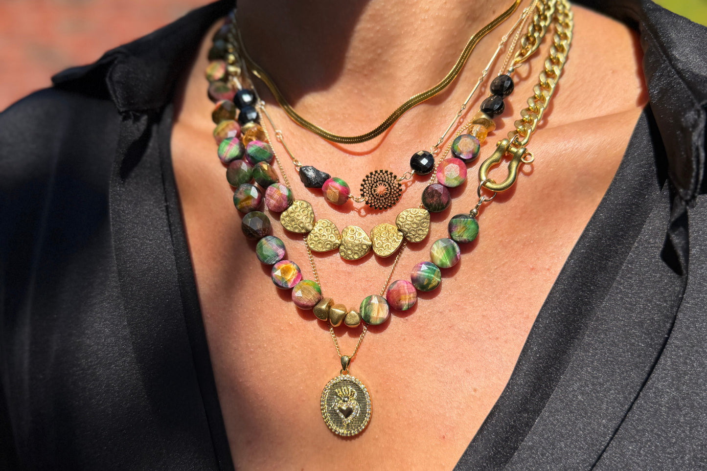Rachel Nathan Shackle Single: Rainbow Tiger's Eye Coin necklace shown on model