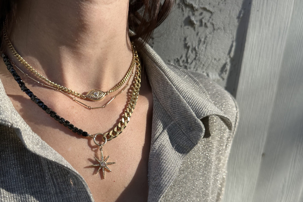 Rachel Nathan Spinel & Spur necklace shown on model