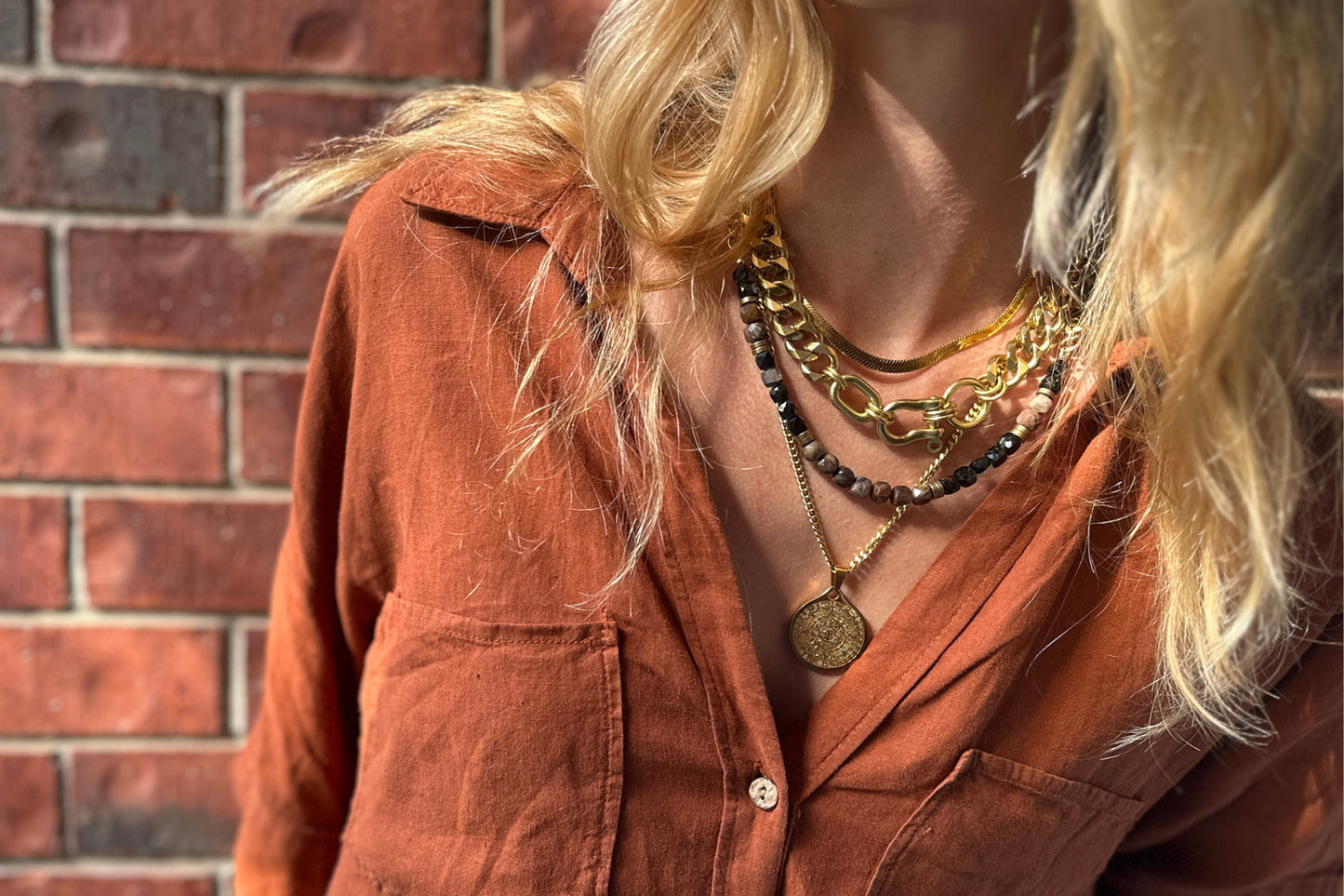 Rachel Nathan Petrified Wood & Tourmaline necklace shown on model