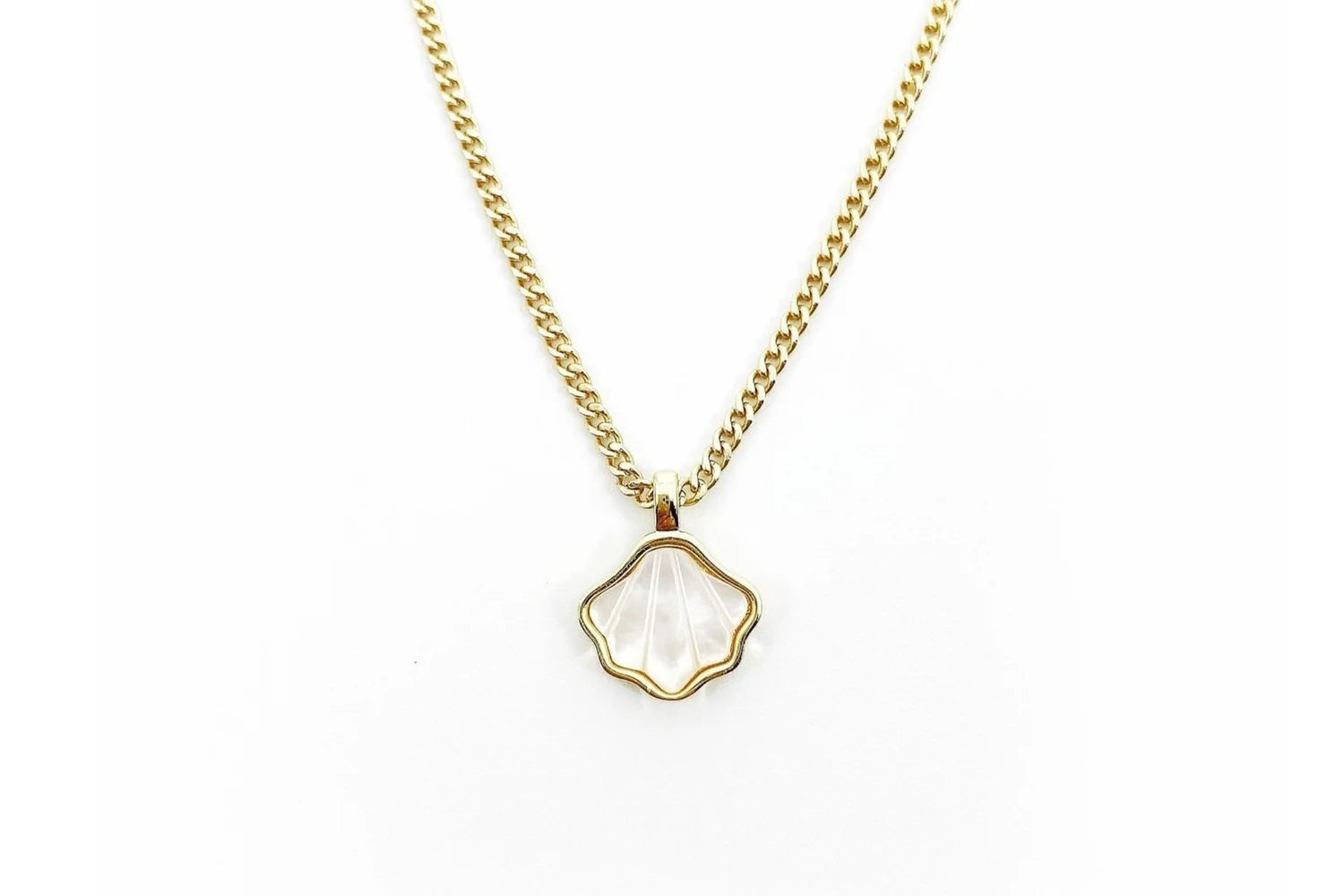 Rachel Nathan Mother of Pearl Seashell necklace, full front view of the gold-filled and mother of pearl shell pendant on gold-filled curb chain